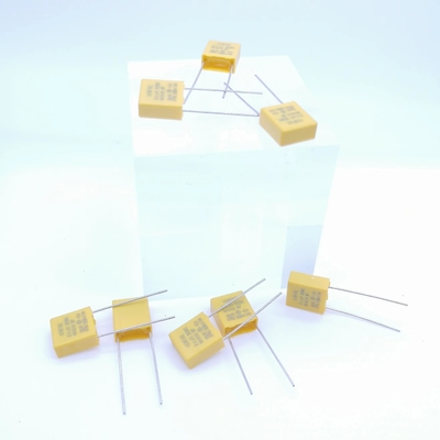 Couleur jaune résistive et capacitive du condensateur 0.1UF 310V P7.5MM de décompression